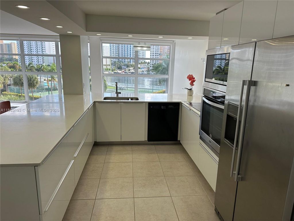 Photo of 400 Leslie Dr #402, Hallandale Beach, FL 33009 (MLS # A11863193)