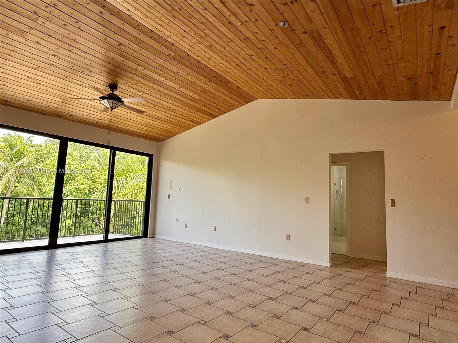 Bright and spacious 3-bedroom, 2-bath penthouse with 1,734 sq. ft. of living space, featuring high cathedral ceilings and large impact-resistant windows providing lots of natural light. This split floor plan offers a fully equipped kitchen, in-unit washer and dryer, a generous walk-in closet. Located in Ocean Village, a resort-style complex just steps from the beach, the community offers two swimming pools, a gym, barbecue area, and lush green spaces. The unit is unfurnished and available for annual lease. TWO ASSIGNED PARKING SPACES