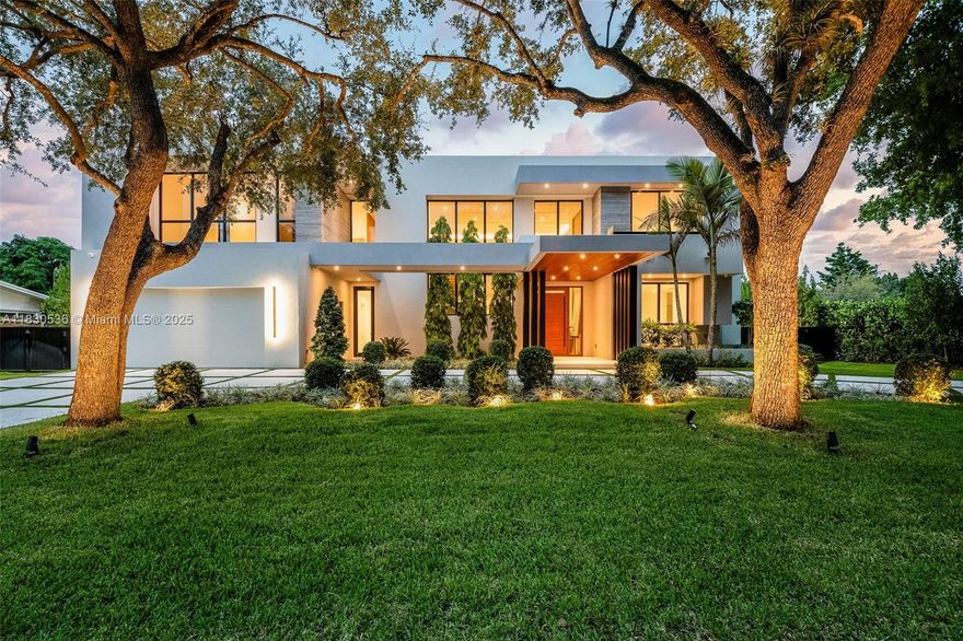 Stunning new construction located in Pinecrest.  Experience modern luxury living in this beautifully designed open floor plan home that features a two-story living and dining room with beautiful custom glass railings and woodwork. This home has 6 bedrooms plus a den.  The kitchen features high-end appliances, dual wine cooler and a walk-in pantry.  Seamless in and outdoor living with expansive outdoor space, covered terrace and summer kitchen make this home perfect for South Florida living. Fully equipped smart home with multi zone speakers, light switches and alarm. This home also includes an elevator, and is electric car charger and generator ready. Every detail was thought of in this home.