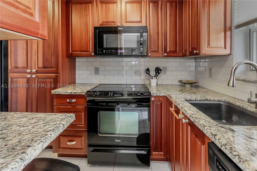 Photo of 1550 N 12th Ct #1A, Hollywood, FL 33019 (MLS # A12099040)