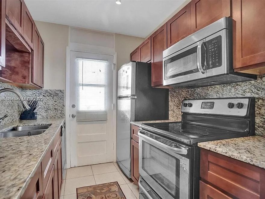 INVESTORS! Bright and spacious 1-bedroom, 1-bath condo in the heart of North Miami, kitchen with granite countertops, SS appliances. The open layout makes it perfect for both everyday living and entertaining. A large bedroom with spacious closet, and a private balcony with breathtaking skyline view, perfect for enjoying sunrise and sunset. Located on a high floor, offering enhanced views and abundant natural light. Gated community with pool, parking, laundry on every floor, and extra storage. Ideally near Biscayne Blvd, major highways, shopping, restaurants, Whole Foods, LA Fitness, and universities (FIU, Johnson & Wales). Minutes from beaches, fine dining, and luxury shopping. Low HOA and no special assessment. Quick HOA approval. Tenant occupied until 11/30/2026. Tenant would renew the lease after the date expiration.