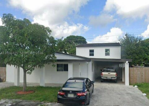 Photo of 20720 NW 34 Avenue, Miami Gardens, FL 33056 (MLS # A12026425)