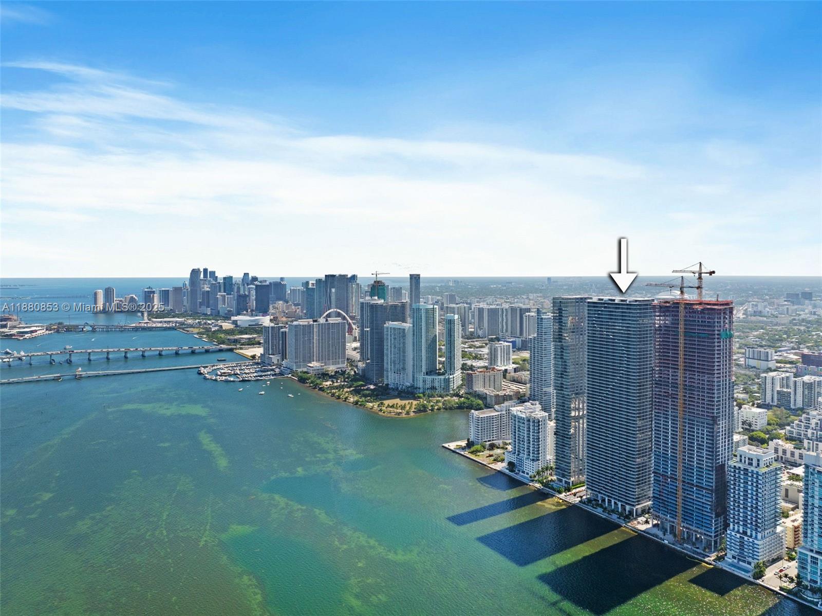 Luxury condo on the 20th floor of Aria Reserve with breathtaking panoramic views of Biscayne Bay! This never
lived-in 1 Bedroom + Den, 2-bath residence features elegant modern design, expansive living areas, and floor-to
ceiling windows that showcase stunning city and bay vistas. The unit is upgraded with glass shower enclosures,
LED-lit mirrors in all bathrooms, and designer curtains in the primary bedroom and living space. Located in a
premier waterfront tower, Aria Reserve offers unmatched resort-style amenities: private sports marina, spa, tennis,
paddleball, squash and basketball courts, mini golf, a dog park, and two pools with water views—including a semi
Olympic pool. Experience elevated living in Miami’s most iconic high-rise