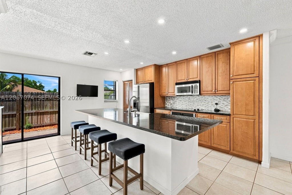 Photo of 206 SE 1st Cir #13-B, Boynton Beach, FL 33435 (MLS # A12067074)