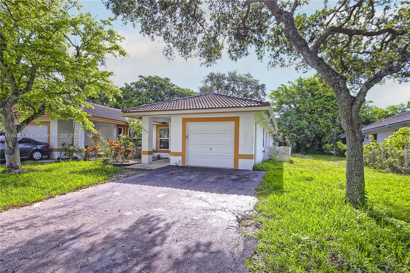 Prime Location in Coral Springs | NO HOA! This freshly painted, move-in ready single-story 3-bedroom, 2-bathroom home is perfect for a starter family and is located just steps from Westchester Elementary School. It features a brand-new, fully remodeled master bathroom, a spacious kitchen with real wood cabinets, granite countertops, and stainless steel appliances throughout. The home also offers impact windows, a washer and dryer, and a beautiful patio ideal for a play area or outdoor dining. Conveniently close to the sports complex, schools, shopping, and all essential amenities—don’t miss out on this opportunity!