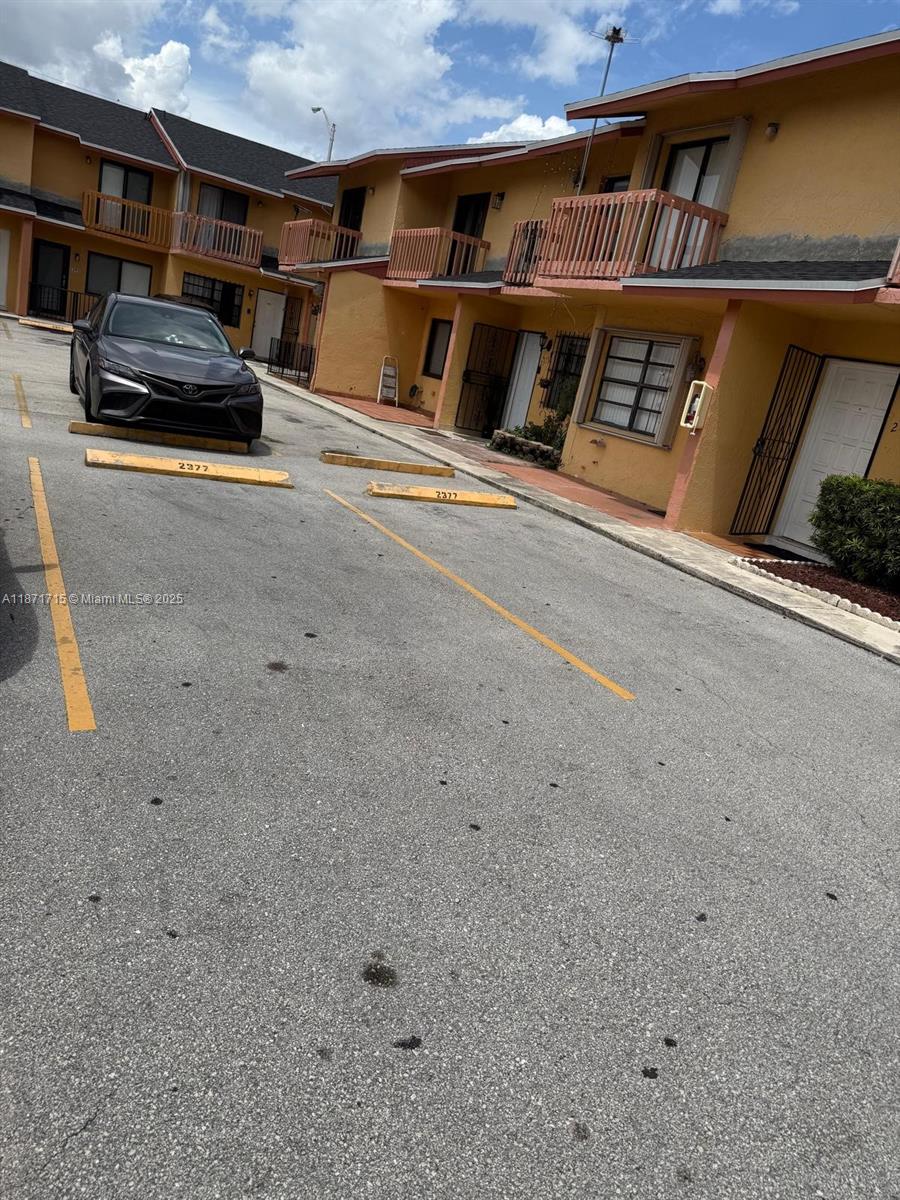 Upgrated 2 floors 2 bedroom and 1.5 baths unit with fenced patio and 2 assigned parking spaces in front of the property. Conveniently located in the west of Hialeah within minutes to schools and shopping. Easy access to Palmetto Expressway and Florida Turnpike. Unit is in perfect condition, washer and dryer in the unit. Low HOA. Come see for yourself it won't disappoint whether you are an investor or want to live in!!!!
