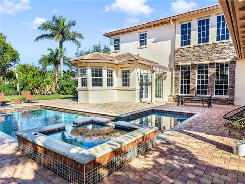 Photo of 12008 NW 69th Ct, Parkland, FL 33076 (MLS # A11910885)