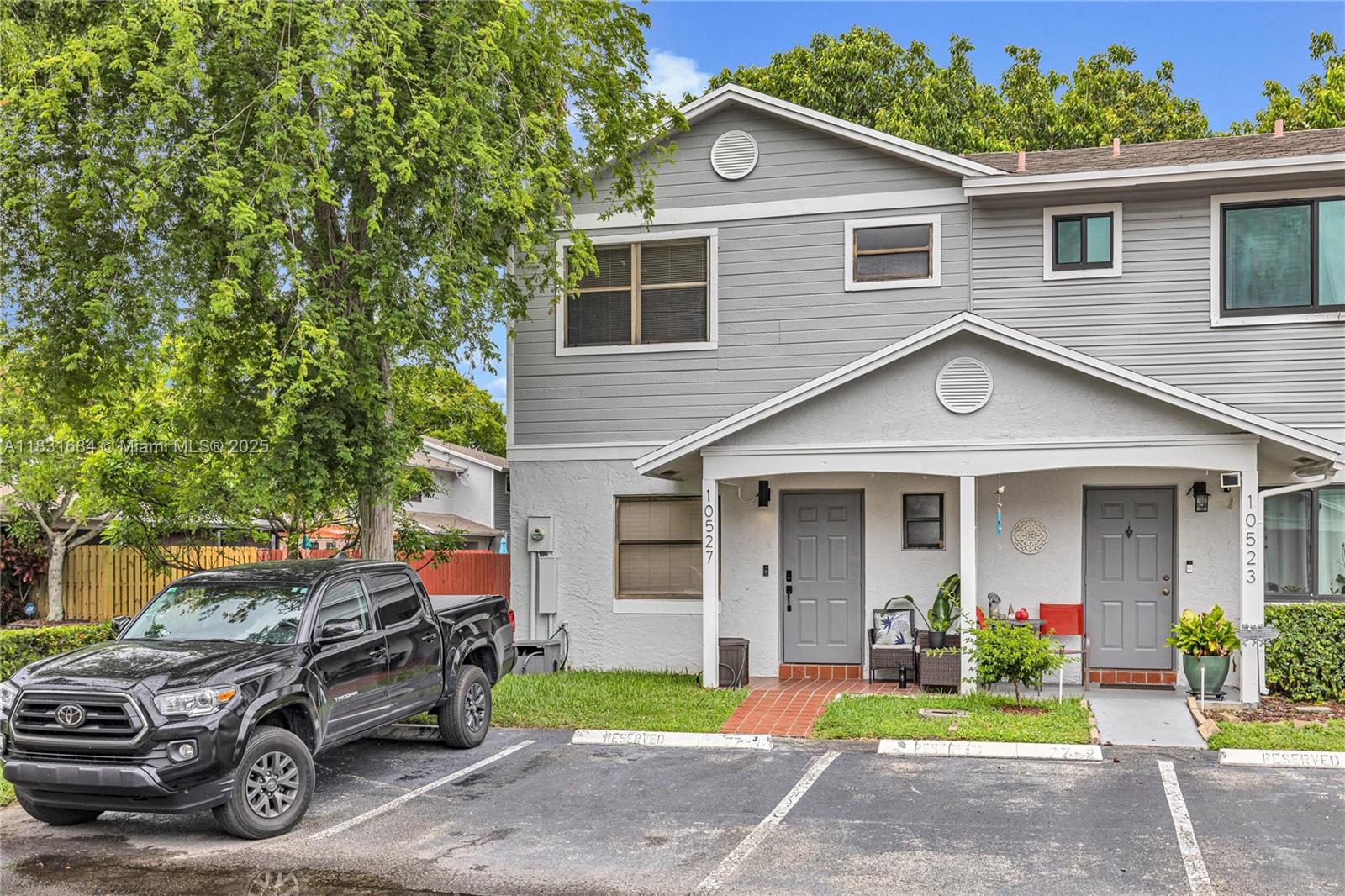 Impeccably maintained and thoughtfully updated, this two-story corner unit townhome offers spacious bedrooms, modern baths and a private backyard retreat. Enjoy the bright, open floor plan, featuring a contemporary kitchen with sleek cabinetry and countertops, and stainless steel appliances. The living and dining areas flow seamlessly, ideal for both everyday living and entertaining. Upstairs, the generous primary suite boasts a walk-in closet and an elegantly renovated en-suite bath. Two additional bedrooms provide ample space for family, guests, or a home office. Enjoy the comfort of a low-maintenance lifestyle with your own fenced yard—perfect for outdoor dining or quiet relaxation. Ideally located near shops, dining and accessibility to expressways.
