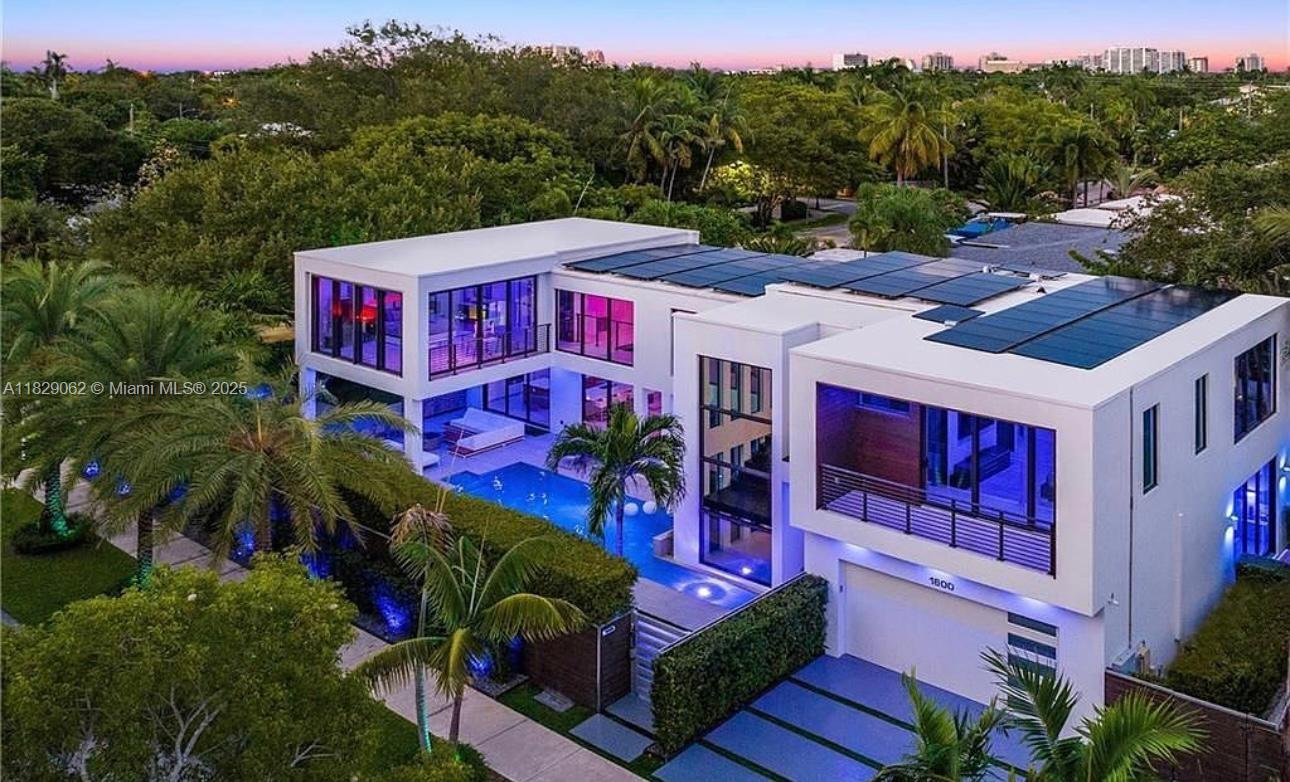 A Modern Masterpiece in the heart of Victoria Park. Discover The perfect harmony of bold Design and Contemporary Luxury in this Stunning Solar - Powered Estate.This 4 bedroom, 4.5 bathroom residence is a true work of art -where vibrant style meets hight -end innovation .Inside, You'll finfan expansive open layout filled with natural light, thanks to dramatic floor-to ceiling windows that blur the lines between indoor and outdoor living. Lighting,SomFy Electric Blinds, ceiling fans, garage doors, main gate and Sonos Sound system Via voice commands or touch panel.Offered fully furnished, this home is the epitome of turnkey luxury- where artistic Sophistication meets cutting edge comfort. The picture and videos of the property are coming soon