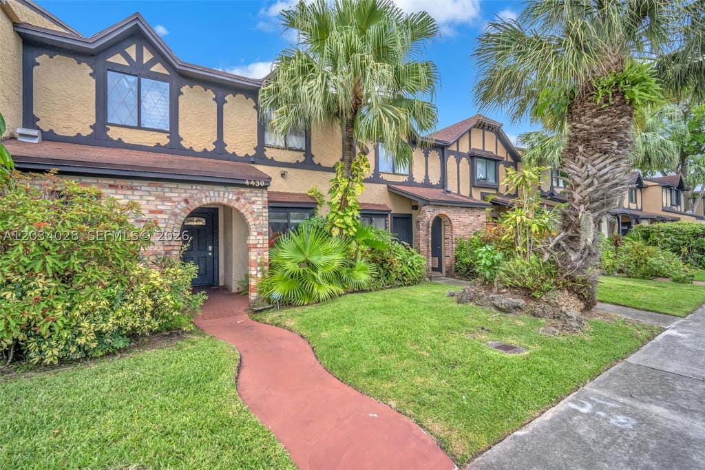 Photo of 4430 NW 92nd Way, Sunrise, FL 33351 (MLS # A12034028)