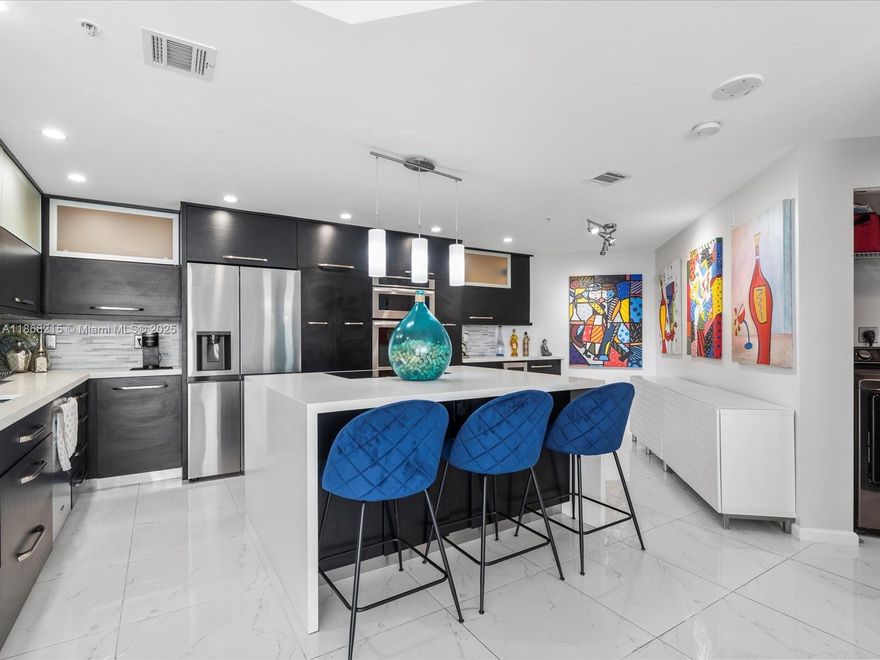 Experience luxury coastal living in this beautifully remodeled, light-filled 2-bedroom, 2.5-bath condo on the 12th floor of Renaissance on the Ocean. Spanning 1,800 sq ft, it offers breathtaking west-facing views of city lights and vibrant sunsets. The chef-inspired kitchen features custom cabinetry, pull-out pantry shelves, a quartz island, and built-in induction cooktop—perfect for entertaining or everyday living. Spacious living and dining areas flow to a private balcony overlooking the Intracoastal. The expansive primary suite boasts ample closets and a spa-like bath. 
Enjoy direct beach access, oceanfront pools, tennis, a state-of-the-art fitness center, full-service spa, concierge, valet, and 24-hour security. Schedule your private showing today!