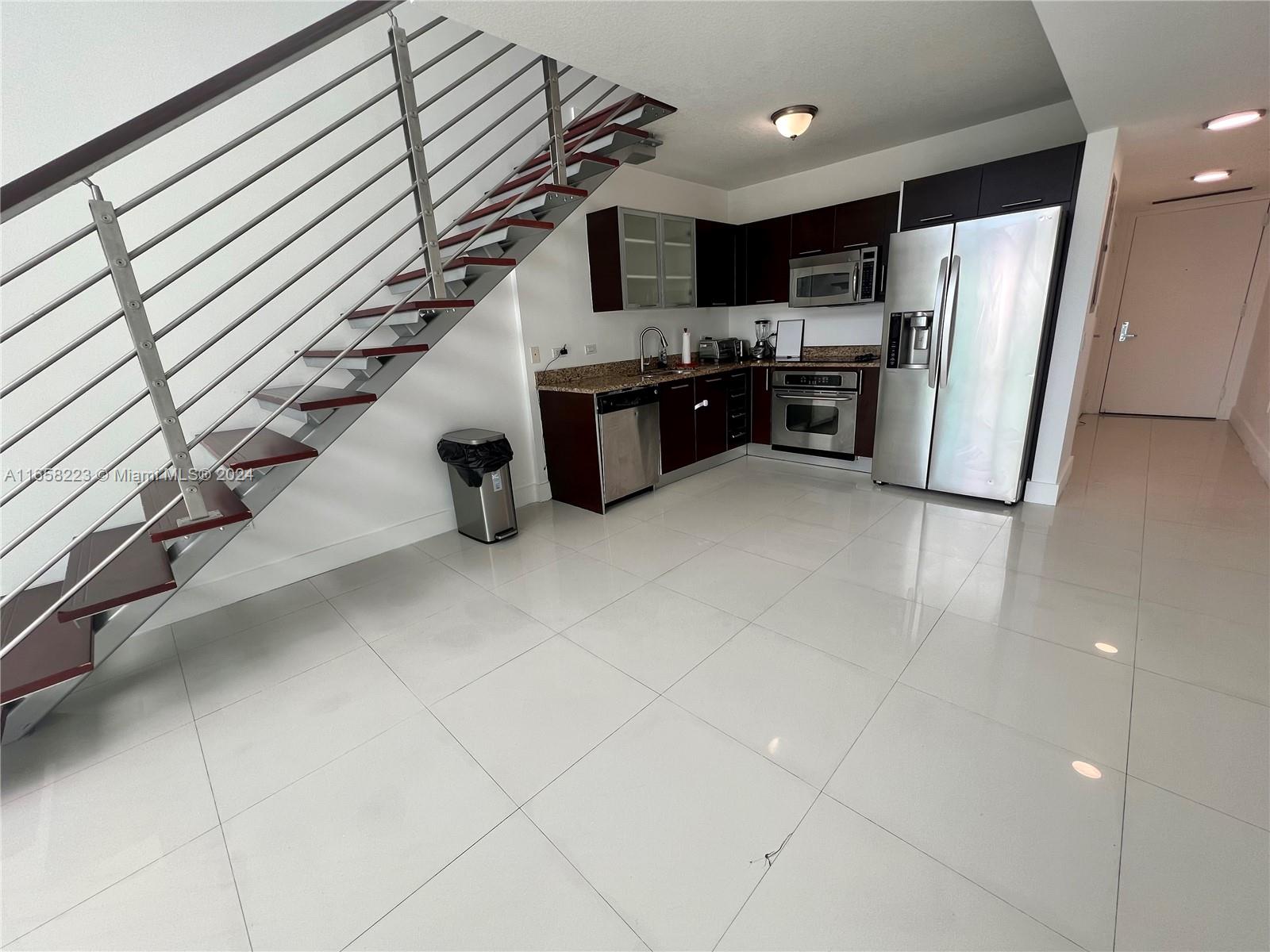 One of the best lines in the building facing North view. Electrical blackouts, porcelain and laminate floors. Amenities include 2 polls, 3 story fitness center, spa, sauna, steam room, 24 hour concierge security. Steps from MetroMover ****** TENANT OCCUPIED UNTIL AUGUST 31, 2025 @ $3,000. Monthly rentals are allowed.