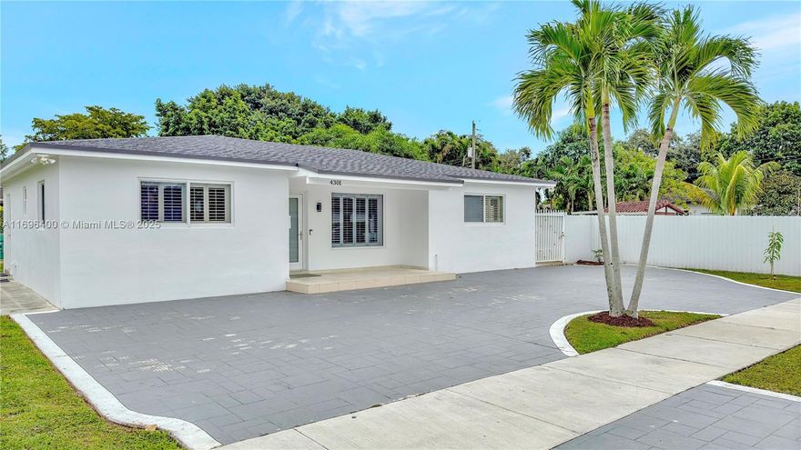 This beautiful 4 bed 3.5 bath home offers an ideal blend of comfort and modern upgrades, featuring a new roof installed in 2022. Located on a spacious large corner lot, the property boasts hurricane impact windows and doors, ensuring both safety and energy efficiency. Also featuring tiled floors throughout, remodeled bathrooms and a remodeled open kitchen complete with stainless steel appliances and ample counter space—perfect for both everyday living and entertaining. A new washer and dryer add convenience to this thoughtfully upgraded home.  The property also includes a fantastic in-law quarters option, featuring a full, brand-new kitchen—ideal for extended family or as a potential rental space.