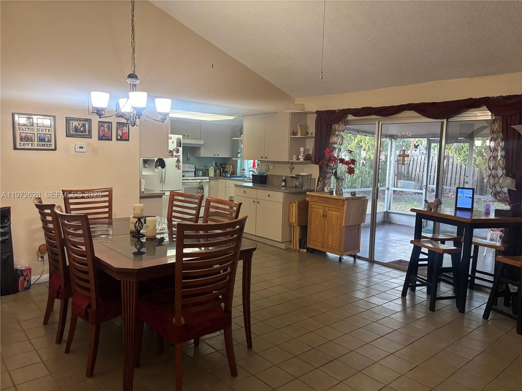 Photo of 11055 NW 27th Pl, Sunrise, FL 33322 (MLS # A11972628)