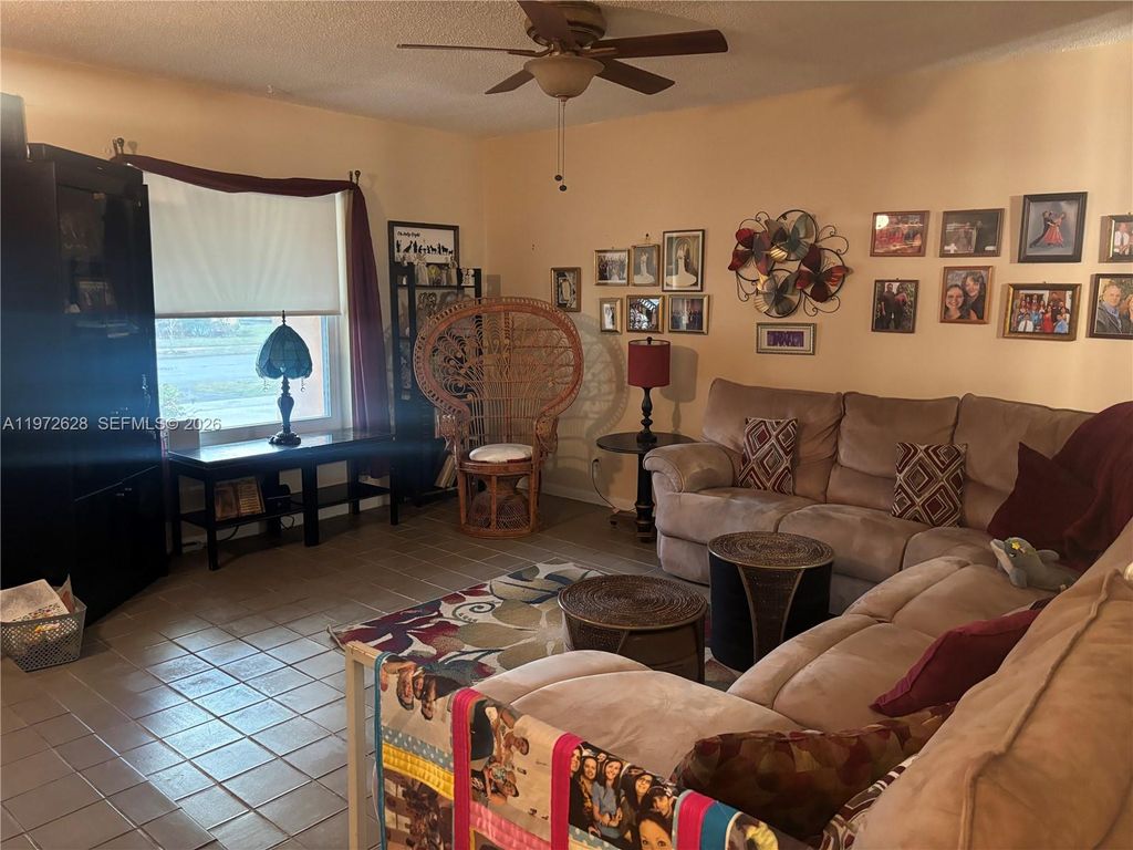 Photo of 11055 NW 27th Pl, Sunrise, FL 33322 (MLS # A11972628)