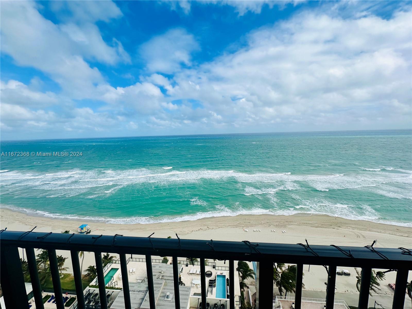 Your senses will come alive with the tranquility of hearing and seeing the ocean waves and its fresh breezes. Enjoy this 2/2 corner unit with a breathtaking view of the ocean from your oversized wraparound balcony. This unit is completely remodeled with tile floors, open kitchen, granite countertops, stainless steel appliances, recess lights, walk-in closet, and hurricane impact windows. The Quadomain has luxury amenities with 2 pools, gym, sauna, restaurant, beach loungers, billiards, business center, valet guest parking, garage parking, concierge, and more. Great location! Walking distance to the famous Hollywood Broadwalk. Near area shops, restaurants,casinos, Aventura Mall, Gulfstream Park, downtown Hollywood, Hard Rock Guitar Hotel, and cruise port. 20 Minutes to Fort Lauderdale.