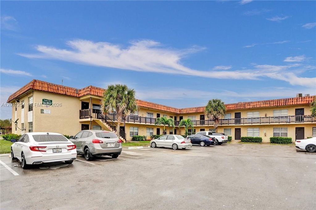 Photo of 1335 S Dixie Hwy #404, Deerfield Beach, FL 33441 (MLS # A12011251)