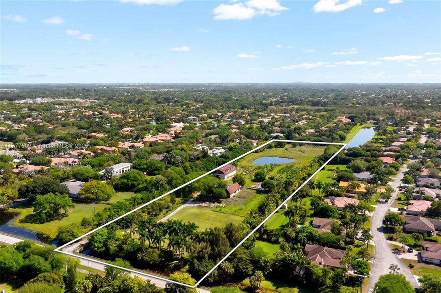 Unmatched opportunity to own nearly 10 acres in one of Davie’s most desirable locations. This exceptional property is already subdivided into four ~2.47-acre lots—perfect for a luxury estate, family compound, or multi-home development. Surrounded by lush greenery and 329 ft of serene canal frontage, the setting is private and picturesque. Potential to replat into eight 1-acre homesites (verify with city). Utilities include electric and municipal water; septic in place. A rare find with endless possibilities near top schools, shopping, and major roadways.