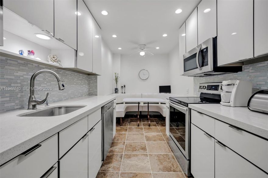 ALL AGES WELCOME!  Wonderfully maintained unit with a beautiful upgraded eat-in kitchen with white kitchen cabinets, quartz countertops and stainless steel appliances.  Spacious leaving room with a glass enclosed balcony which makes for a perfect office or den.  A pleasure to sit and enjoy your garden and pool views.  Large master suite with plenty of closet space and large hurricane proof window.  Excellent parking space location.  Furniture included if desired.  Extremely well maintained building which features 24/7 security, extra storage, bike room, heated pool, clubhouse with full kitchen and outdoor bar/BBQ area, walking trails, tennis and pickleball membership available.  Hillcrest is in an excellent location minutes to shopping, dining, beaches, Ft. Lauderdale Airport, Hardrock Hotel and all major highways.  ESA/Service Animals accepted.  No leasing.  25% down for financing.