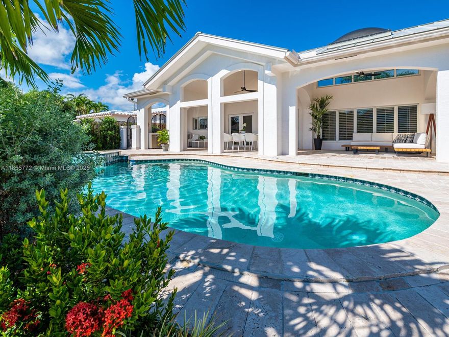 Beautiful home on the water, with 3 bedrooms and 2 bathrooms. Huge exterior covered Patio with grill, dining table, sofa, and lounge beds. Private heated pool and spa, and Dock Space (70' waterfront) with a Tranquil view of the water and landscaping. Located in a quiet and safe neighborhood that is within walking distance to the beach, mall, grocery stores, and plenty of restaurants and cafes. The home comes equipped with everything you'll need to feel at home and comfortable. Short-Term Rental Available.