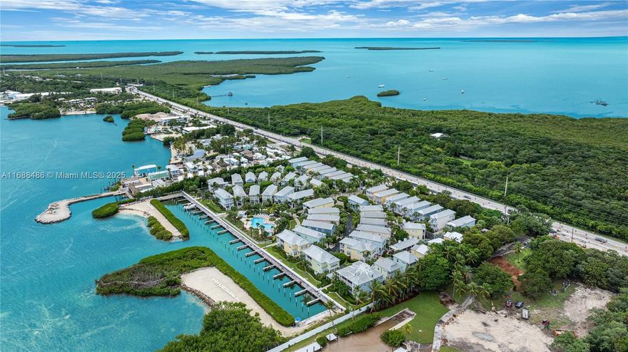 Islamorada Exclusive Anglers Reef Resort! An oceanfront gated community with resort -style amenities, marina, & 2 sandy beaches; this fully furnished, two-story single-family home, w/ 2 Bedrooms, 2.5 Baths, is a treasure for ocean lovers & investors alike. Premium features include impact windows & doors, stainless steel appliances, wood cabinetry, & granite countertops. A Boater’s Paradise with direct oceanfront access & proximity to the famous Islamorada sandbar, & a deeded boat slip is also available for sale, accommodating a boat up to 31 feet. 

Proven Rental Success, in a well-established program, this home has a 7-Day rental license, with over 175 five-star reviews, making it an ideal investment opportunity or personal retreat. Pet friendly community.