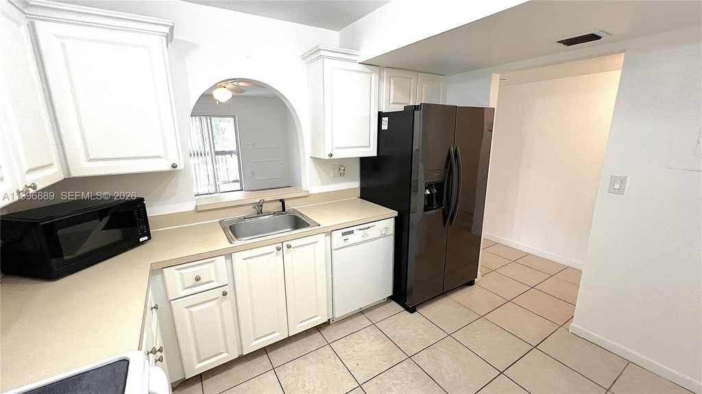 Photo of 711 N Pine Island Rd #211, Plantation, FL 33324 (MLS # A11996889)