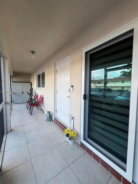 Photo of 5387 SW 40th Ave #103, Dania Beach, FL 33314 (MLS # A11882118)