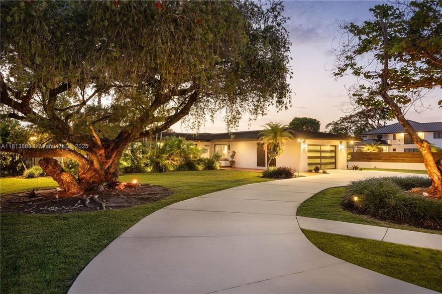 Meticulously renovated & fully turnkey, this 4BD + office / 3BA home is set on a 25,000+ ft² cul-de-sac lot. Surrounded by lush landscaping & a privacy wall with motorized gates, the property offers seclusion, a tranquil koi pond in front, a resort-style pool in back, & a tropical atrium that sets the tone for the home’s vibrant indoor-outdoor lifestyle. Inside, enjoy multiple living rooms, a dedicated office, a designer eat-in kitchen, & hidden butler’s pantry. Renovated as a forever home with no expense spared: engineered hardwood floors, all new plumbing, impact windows/doors, new electrical, Ethernet, new HVAC, & smart lighting. A fruit tree grove & multiple indoor/outdoor entertaining areas complete this move-in-ready oasis. All major systems replaced in the past 2 years.