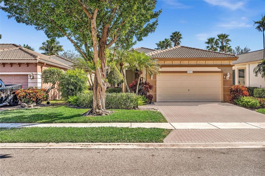 Photo of 5851 NW 125th Ter, Coral Springs, FL 33076 (MLS # A11963283)