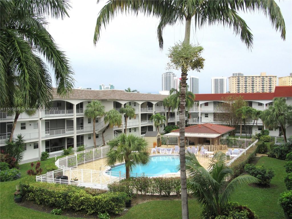 Photo of 581 Blue Heron Dr #303-B, Hallandale Beach, FL 33009 (MLS # A11505638)