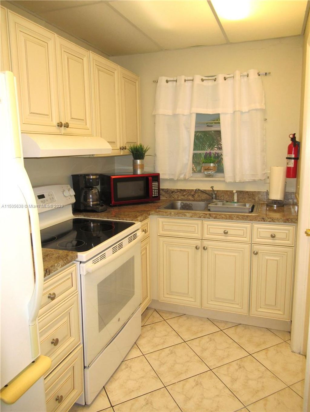 Photo of 581 Blue Heron Dr #303-B, Hallandale Beach, FL 33009 (MLS # A11505638)