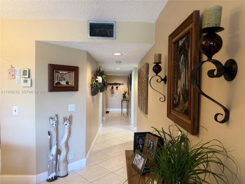 Photo of 1100 SW 130th Ave #401H, Pembroke Pines, FL 33027 (MLS # A11959212)