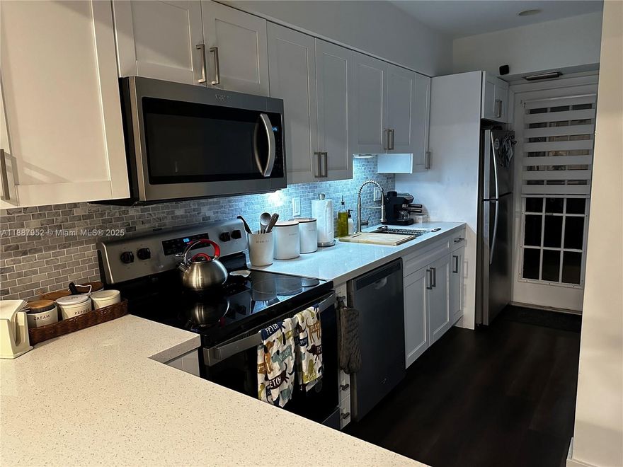 Step inside into this remodeled 2 Bed 2 Bath Townhouse. features a Gourmet kitchen boasting stainless steel appliances, granite counters and a walk-in pantry. The primary suite is a retreat with a luxurious spa-like bath, oversized walk-in closet, and serene views. Laminate floors flow seamlessly throughout and beautiful Cathedral ceilings. Rent includes Water/Sewer and two assigned parking spots.