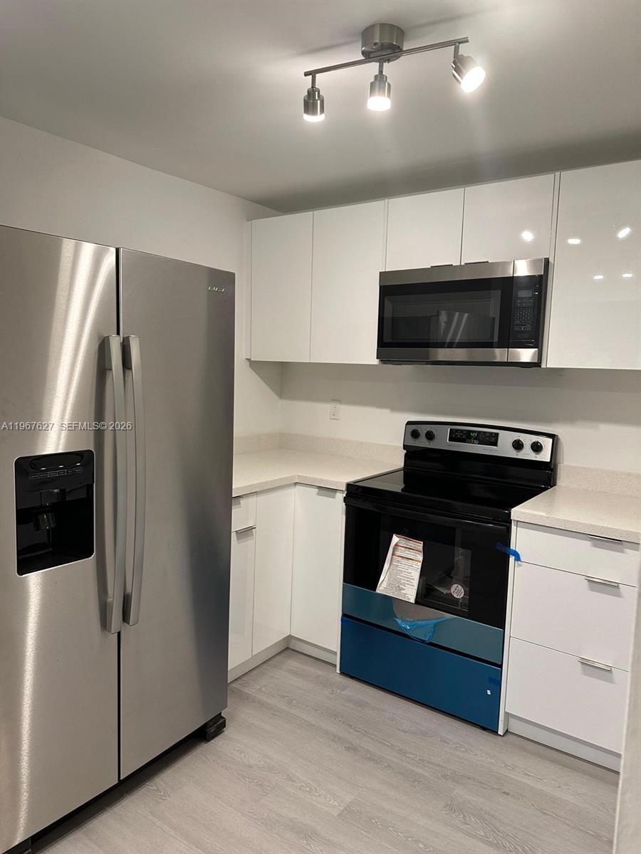 PALM GARDENS CONDO - Residential Lease