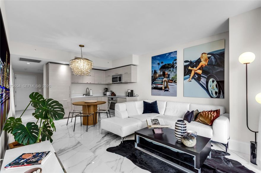 The perfect Miami seasonal rental! This fully designer-furnished residence on the 25th floor offers 1 bedroom, a versatile den, and 1.5 bathrooms across 649 sq ft. The condo features beautiful southeast-facing water views from an oversized private balcony, creating the perfect setting to relax above the city. The unit is completely move-in ready with floor to ceiling impact glass, sleek porcelain tile flooring, custom closets, electronic blackout shades, a den with desk perfect for a remote worker, and an in-unit washer and dryer. The open kitchen is finished with quartz countertops, modern cabinetry, and Bosch appliances, giving the space a clean, modern feel. Residents enjoy five-star resort-style amenities, and hotel services, including a rooftop sky pool deck with panoramic views, a state-of-the-art fitness center, Spa with steam rooms, sauna, relaxation lounges, massage services, and large pool with food and beverage service. The building also offers a residents’ lounge, screening room, kids’ playroom, and multiple restaurants on site, including Rosa Negra. One assigned parking space included. Perfectly located in Brickell allowing easy access to all that Miami has to offer. Available from May 1st to  November 30th. Reach out today!