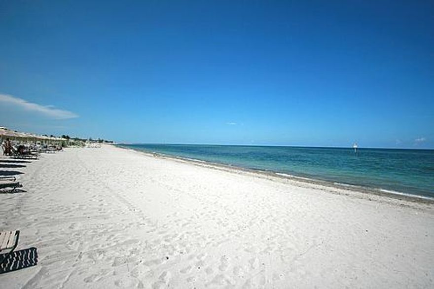 Beautiful open sunny views from this Southern exposure 2 bedroom  Condo, in one of the finest mid-level developments on Key Biscayne. Just steps to shopping and Key Biscayne elementary school, this is a perfect apartment for a family. Smartly designed with southern exposure pool, covered parking, security and great location. One covered parking and ample guest parking.
This condo has been nicely updated throughout with the exception of the kitchen.