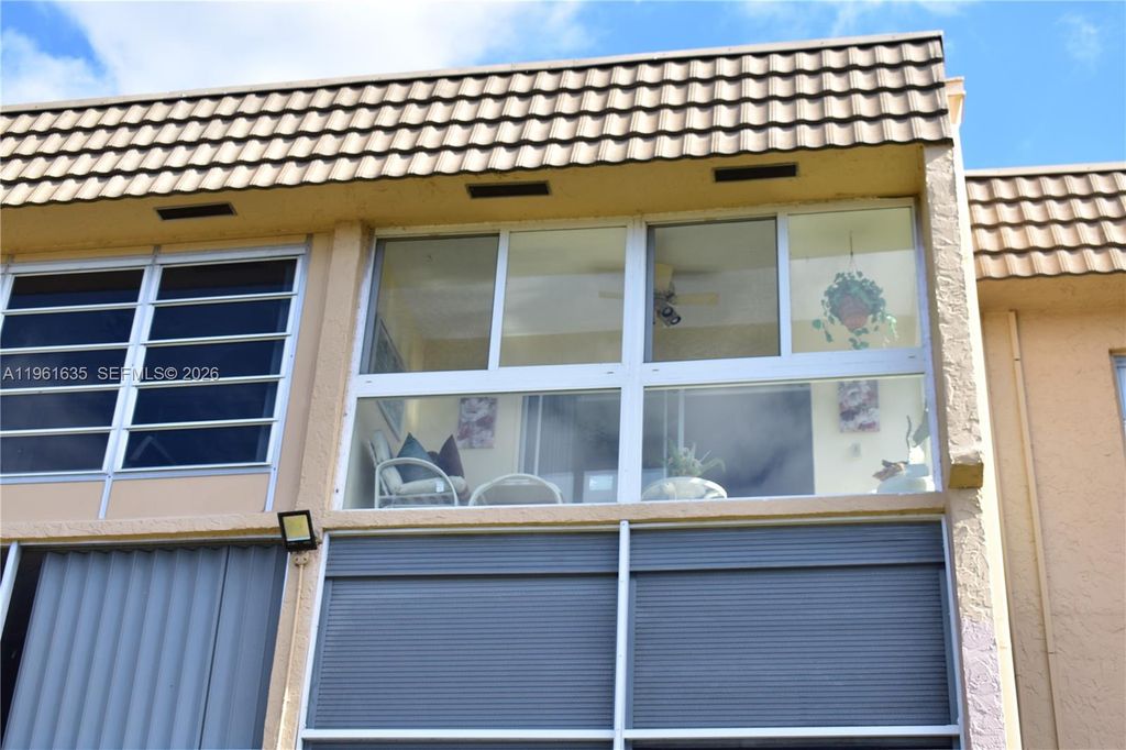 Photo of 9201 Sunrise Lakes Blvd #308, Sunrise, FL 33322 (MLS # A11961635)