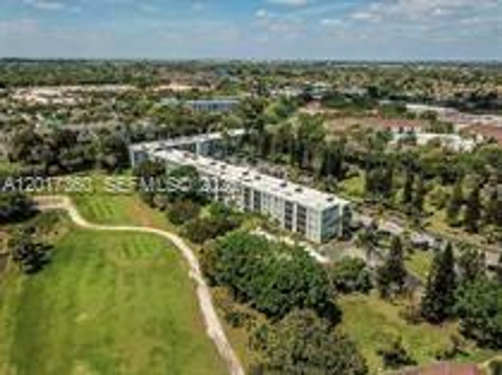 Photo of 8445 Springtree Dr #309A, Sunrise, FL 33351 (MLS # A12017360)