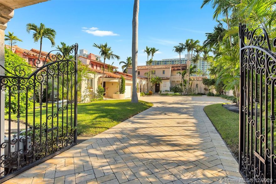 Welcome to “Villa Mare”! Behind stately wrought iron gates lies this illustrious gated waterfront Mediterranean estate on prestigious Pine Tree Drive! Villa Mare sits on an expansive 13,623 SF lot Overlooking the Indian Creek Waterway & features 78 ft of WF w/ oversized dock. No fixed bridges to bay! Interior boasts a sprawling 4,172 total SF with 5bd/5.5ba (2/2 up, 2/2.5 down + 1/1 detached guesthouse.) Gourmet kitchen plus one-of-a-kind iconic "Monkey Bar" terrific for entertaining hand painted by J. McGibbon Brown. Uniquely architected facade featuring grand archways, beautiful tile/stone work, custom coral door/window framing, high ceilings & a marble fireplace. Sunny glass Florida room with terrazzo flooring overlooks waterfront patio! Minutes from the best Miami Beach has to offer!