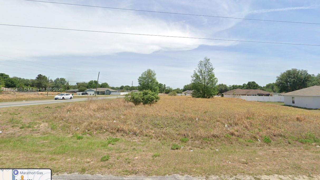 Don’t miss out on this exceptional opportunity to own a cleared, build-ready corner lot in a thriving area of Silver Springs Shores. Conveniently located less than 30 minutes from I-75, Ocala International Airport, major shopping centers, and medical facilities, this parcel offers both accessibility and potential. Enjoy the ease of having top-rated schools, grocery stores, churches, fast food options, and a golf course all within 5 minutes, with a gas station just a minute away. Nature lovers will appreciate being only 10 minutes from the stunning Silver Springs and Juniper Springs. Utility and electrical connections are available, making this property ideal for your future home or investment project. Opportunities like this don’t last—act now!