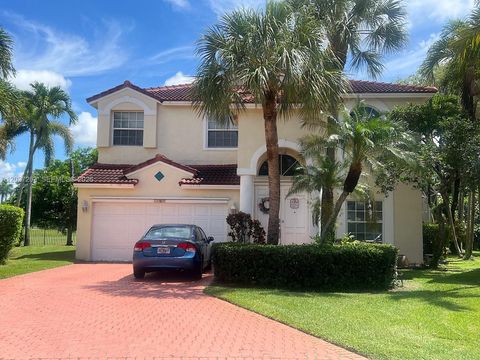 Photo of 1625 SW 156th Ave, Pembroke Pines, FL 33027 (MLS # A12027263)