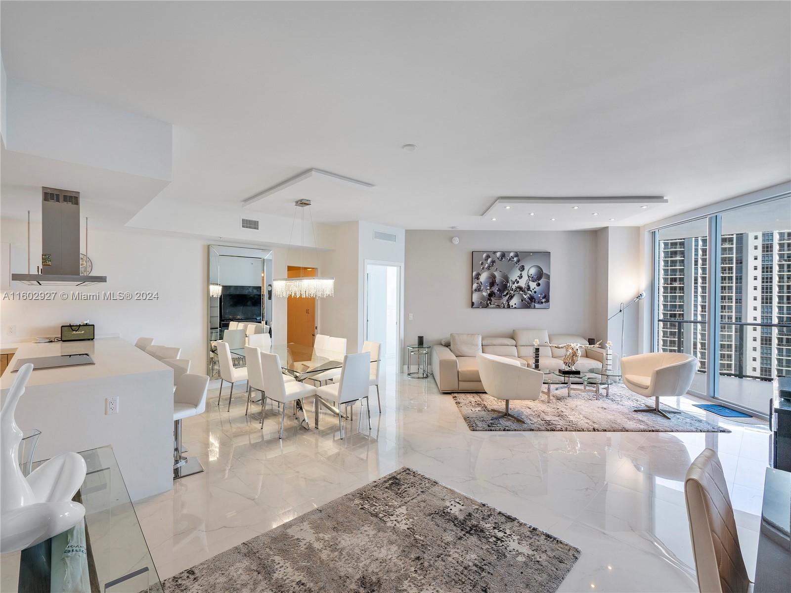 One-of-a-kind floor plan.  Unfurnished 2 Bedroom + Den and 2.5 Baths (see Photos).  Views looking North East directly to the water/private Marina.  White porcelain tile and Italian Closets.  Wolf and Subzero appliances, Snaidero Cabinets in Kitchens and bathrooms.  2 Parking Spaces and 1 Storage.