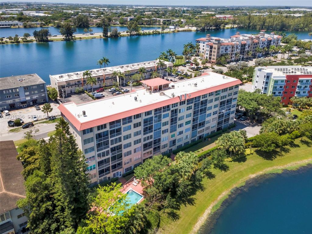 Photo of 1101 Crystal Lake Dr #203, Deerfield Beach, FL 33064 (MLS # A12016396)