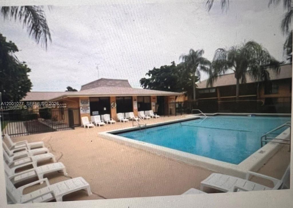 Photo of 5821 Washington St #31, Hollywood, FL 33023 (MLS # A12001077)