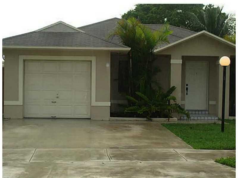 GREAT 4/2, 4TH ROOM IS THE GARAGE CONVERTED AND CAN BE USED AS BEDROOM, PLAYROOM OR OFFICE. TILE AND WOOD FLOORS THRU-OUT, MASTER WITH WALK IN CLOSET. BACKYARD WITH STAMPED CONCRETE, NO ASSOCIATION! NO FORECLOSURE WORRIES, WILL NOT LAST. SMALL PETS OK.