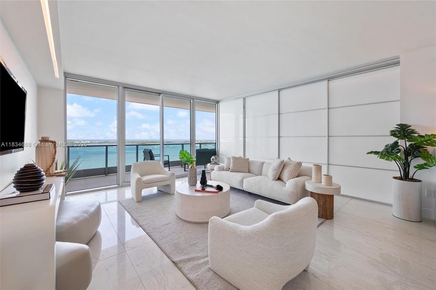 Direct ocean view - 3 bedroom, 3 bathroom luxury condo in the prestigious Jade Residences at Brickell Bay. 2,130 SF.  East-West flow. 2 expansive terraces, sunrise & sunset views. Floor-to-ceiling windows w/great natural light, Elevator opens into private foyer entry, into a sleek, open-concept layout. Custom-designed sliding doors between the living room & primary suite, provide flexibility & style. Primary bathroom features dual vanities, a walk-in shower, modified soaking bath & 2 walk-in closets. Modern kitchen w/ Sub-Zero & Miele appliances, dual ovens, wine cooler, custom cabinetry. World-class amenities: state-of-the-art fitness center, infinity-edge pool, spa, reflection pool & more. 24-hour front desk, concierge services, valet parking. Close to shopping, dining & entertainment.