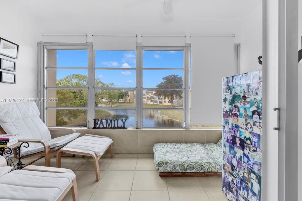 Photo of 6071 NW 61st Ave #303, Tamarac, FL 33319 (MLS # A11928122)