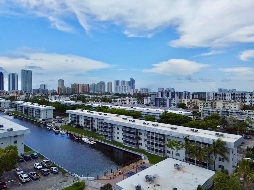 Experience the ultimate waterfront boating lifestyle in prestigious Eastern Shores without the luxury price tag! Located in the ultra-quiet 55+ Eden Isles community, this rare, first-floor garden home allows you to skip the elevators and walk straight into your move-in-ready oasis.
THE RESIDENCE: Fully remodeled kitchen with wood cabinetry, granite counters & premium Bosch appliances.  Peace of mind: Brand-new 2025 A/C (with warranty) & high-impact entry door/bedroom window.  Custom closets, updated lighting, and extra storage available. Screened balcony overlooking the wide 85-ft canal—always cool and shaded with no direct sun!
THE BUILDING & ISLAND, Sits on a non-flooding, private island with a single entry point.  Passed 50-year certification! Major upgrades include: new metal roof (50-yr warranty), restored seawall, new elevator, updated floors, new security cameras, and enhanced landscaping. Bring your boat! Dockage available to rent or purchase.
LIFESTYLE & AMENITIES: Resort-style heated pool, clubhouse, new gym w/ showers, sauna, BBQ, theater & billiards. Low HOA includes water, high-speed internet, cable, reserves & monthly pest control. Free community shuttle. Walking distance to the beach, shopping, and dining. Surrounded by ultra-luxury neighbors like Williams Island and Acqualina.
Perfect snowbird retreat! HOPA 55+. One rental per year allowed after the 1st year of ownership. 3-D Virtual Tour & floor plan available—contact listing agent!