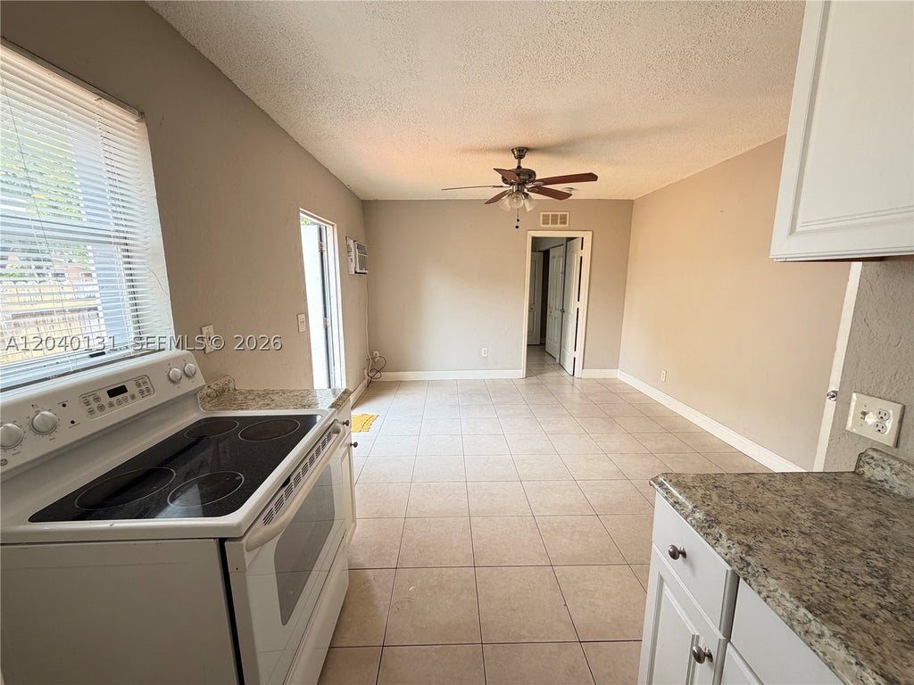 Photo of 6012 SW 38th St #4, Miramar, FL 33023 (MLS # A12040131)