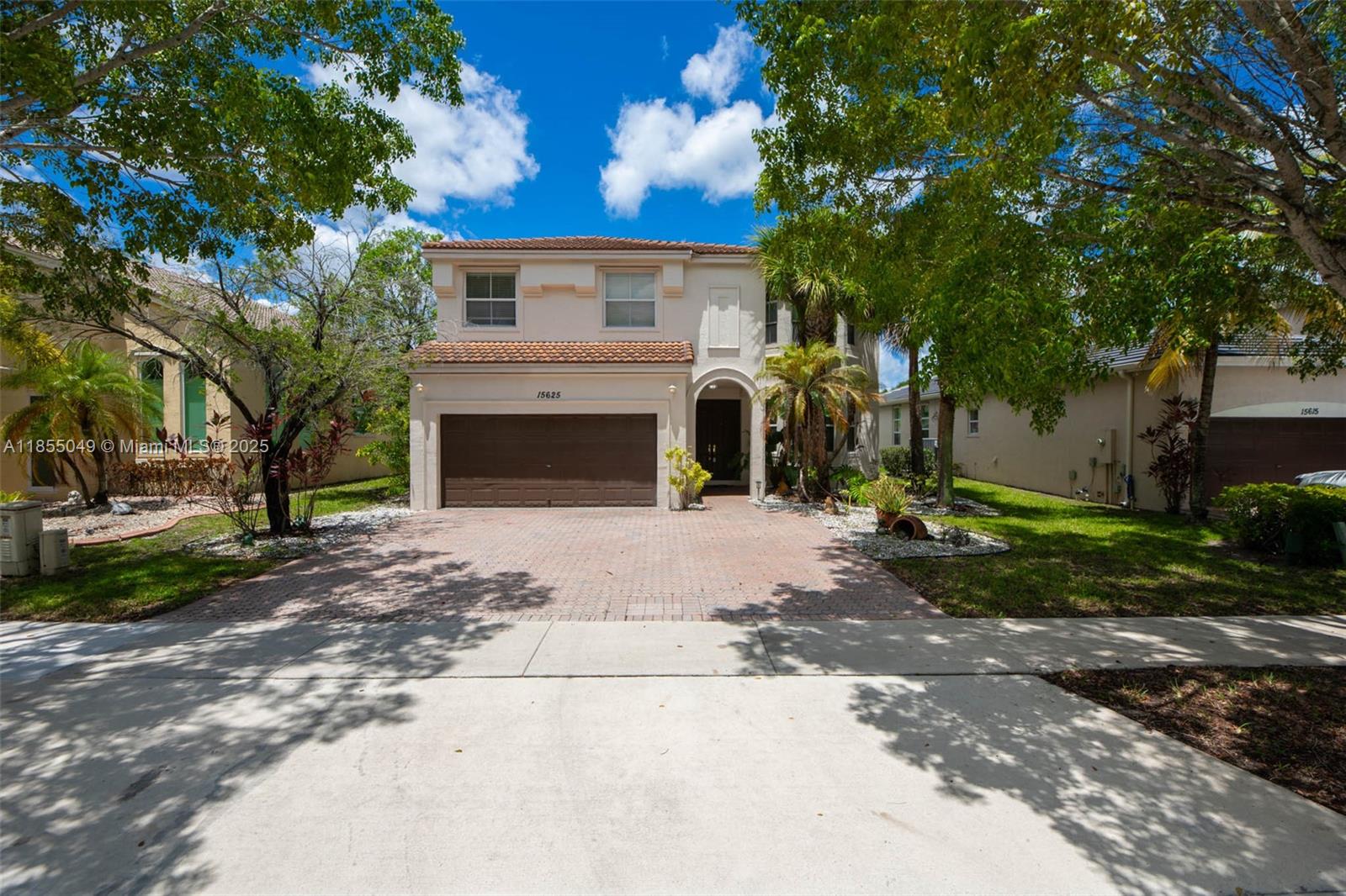 Fabulous two story home in a gated community in Riviera Isles with amazing lake view, 5 bedrooms /2.5 baths, two-car garage + 3 parking spaces. Volume ceilings and lots of natural light. Formal & separate dining / living room. Spacious kitchen with a large family room that overlooks the beautiful lake area and Great Backyard. Master bedroom on the second floor. Club House with tons of amenities: tennis-basketball courts-pool-gym. Close to I-75-Schools-Hospitals-Dining-Malls-Airports.